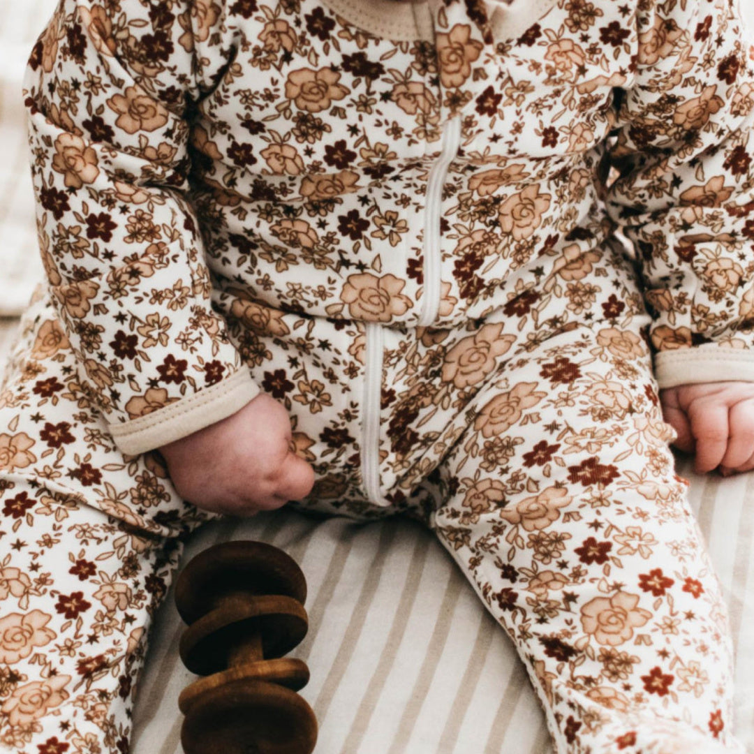 BENCER & HAZELNUT POINSETTIA ZIP ROMPER