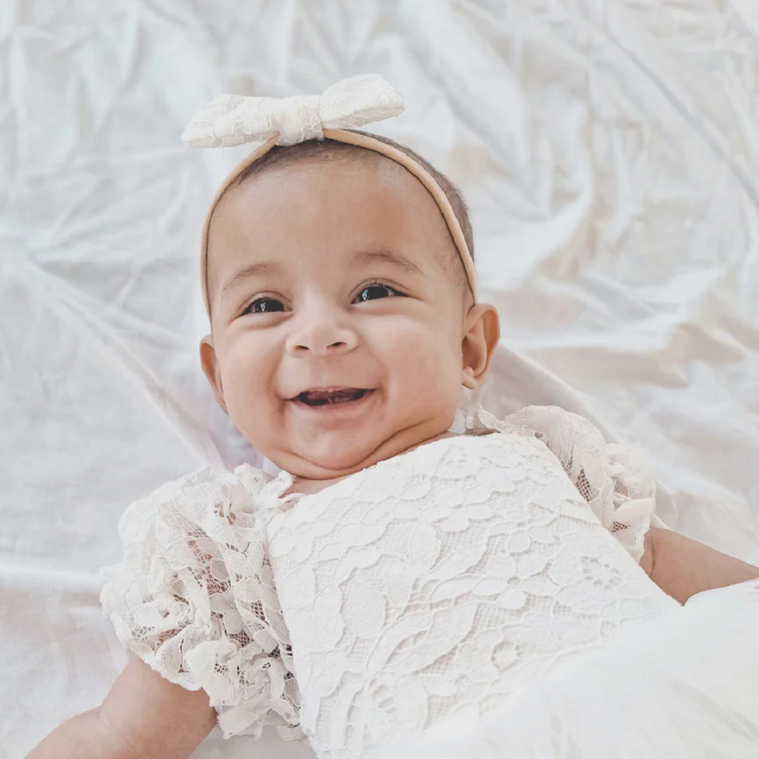 A LITTLE LACEY CALLISTA WHITE BOW