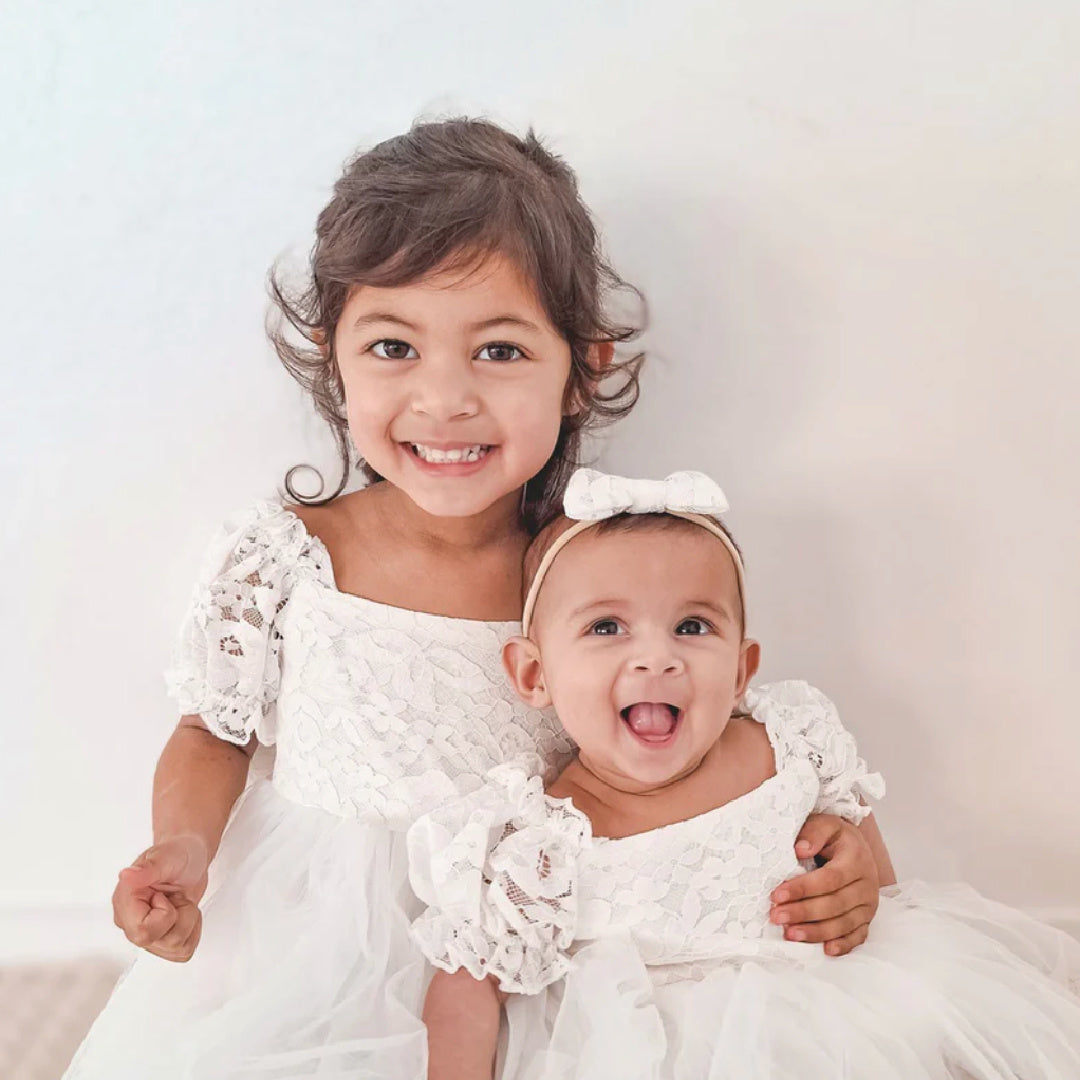 A LITTLE LACEY CALLISTA WHITE BOW