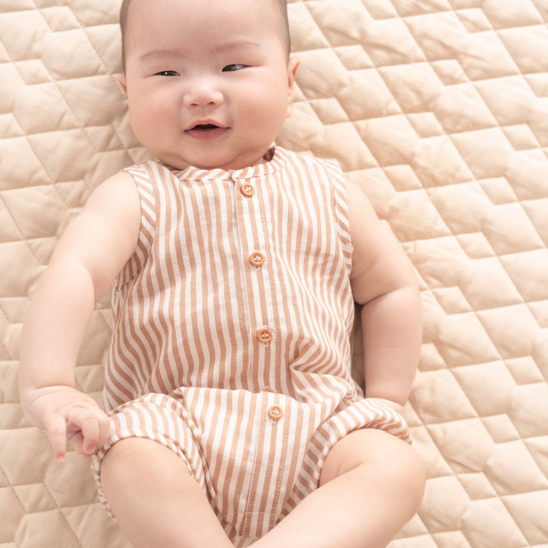 BEBE BRADY STRIPE WOVEN ROMPER