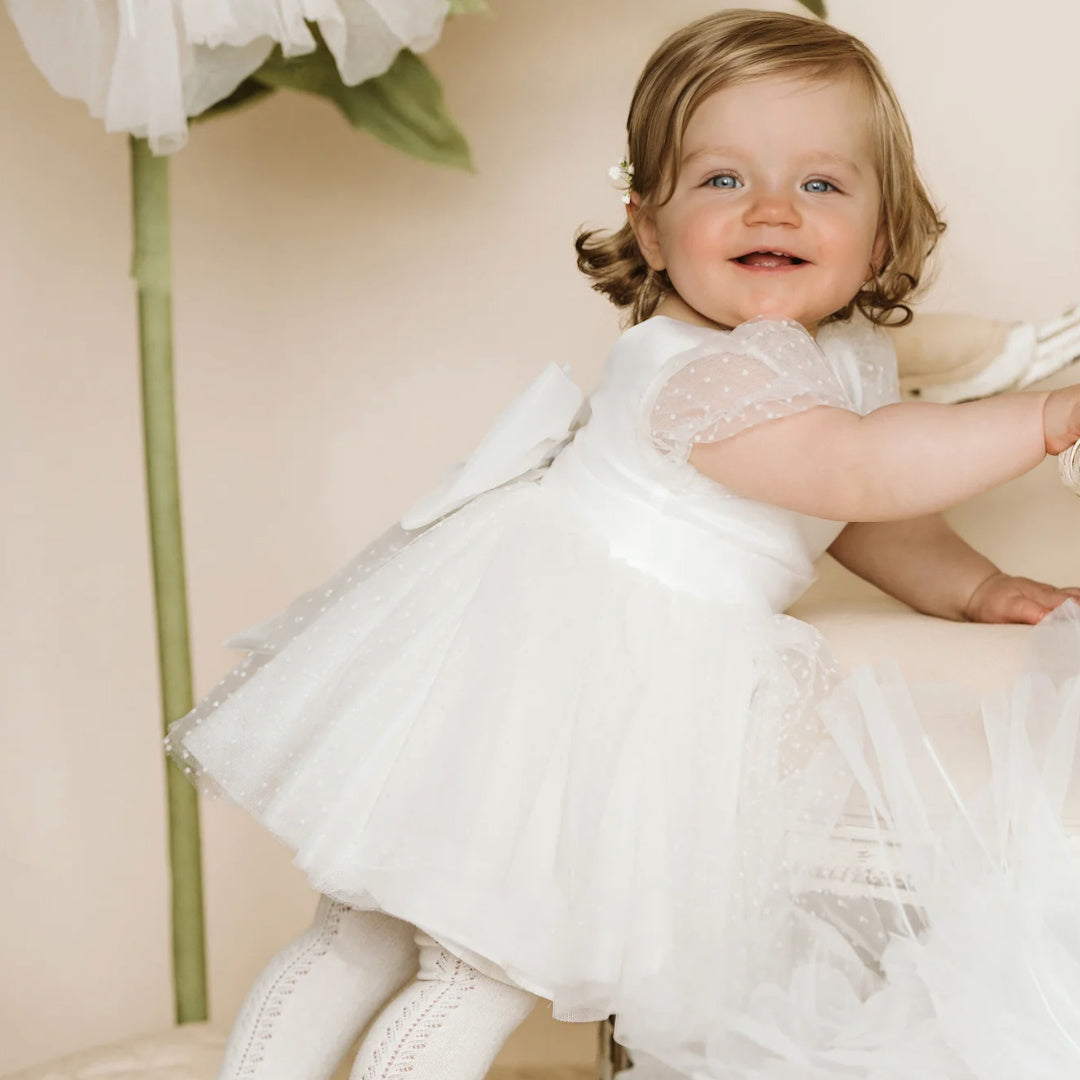 BEBE IVORY SPOT PUFF SLEEVE DRESS WTH BACK BOW