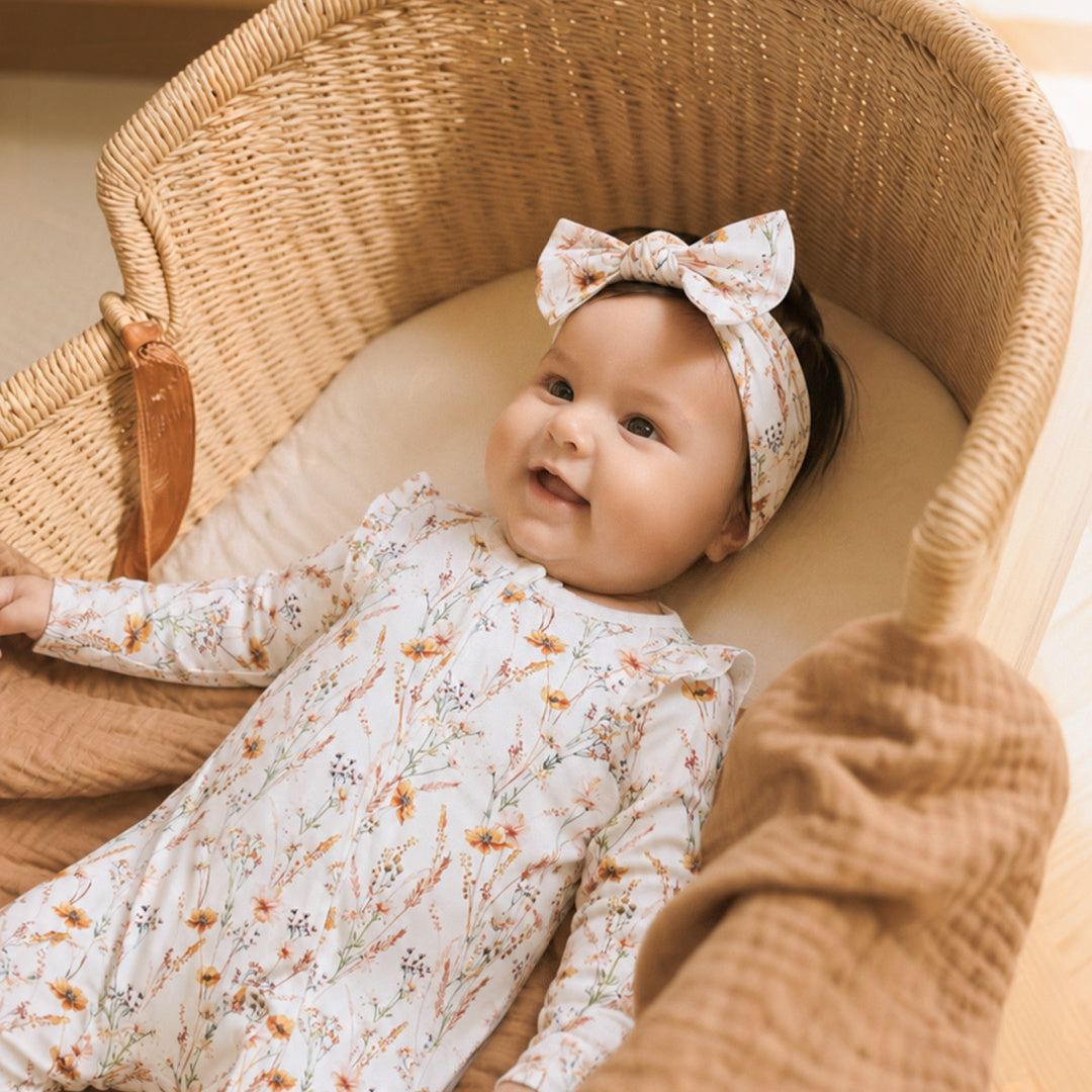 BEBE TAYLOR ORGANIC FLORAL LS ZIPSUIT