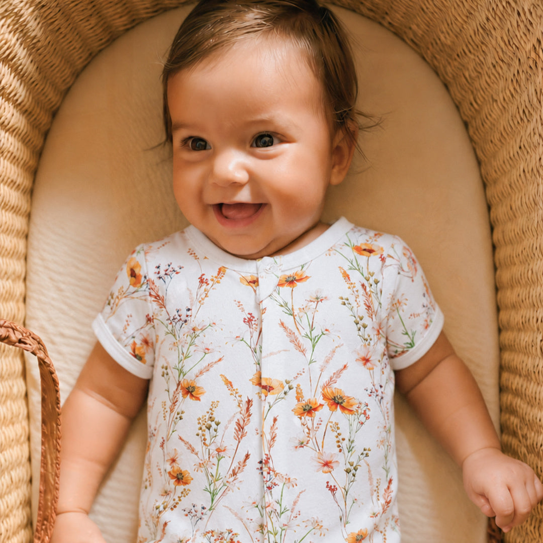 BEBE TAYLOR ORGANIC FLORAL SS ZIP ROMPER