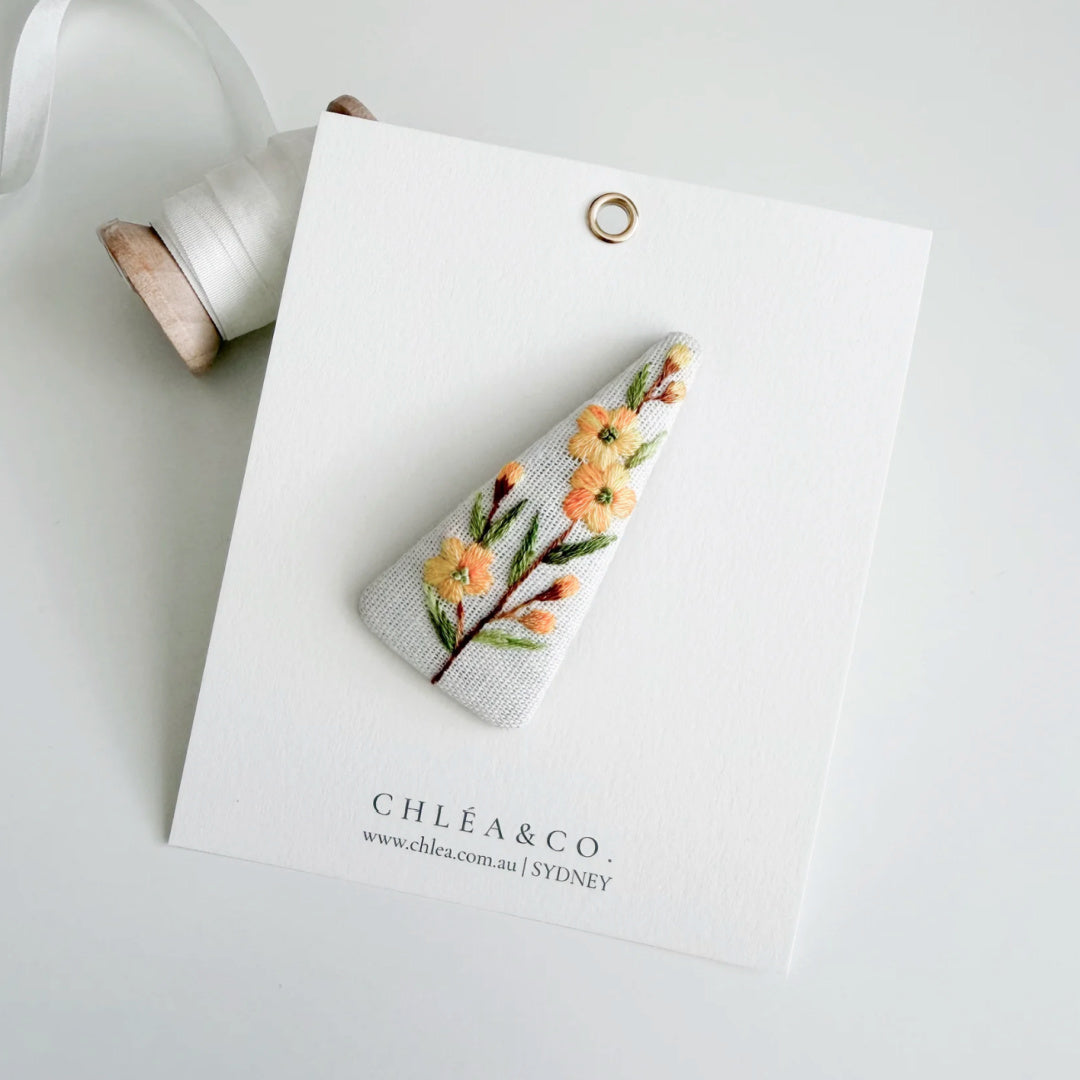 Chléa &amp; Co Embroidered Hair Clip | Spring Flowers on Grey Linen