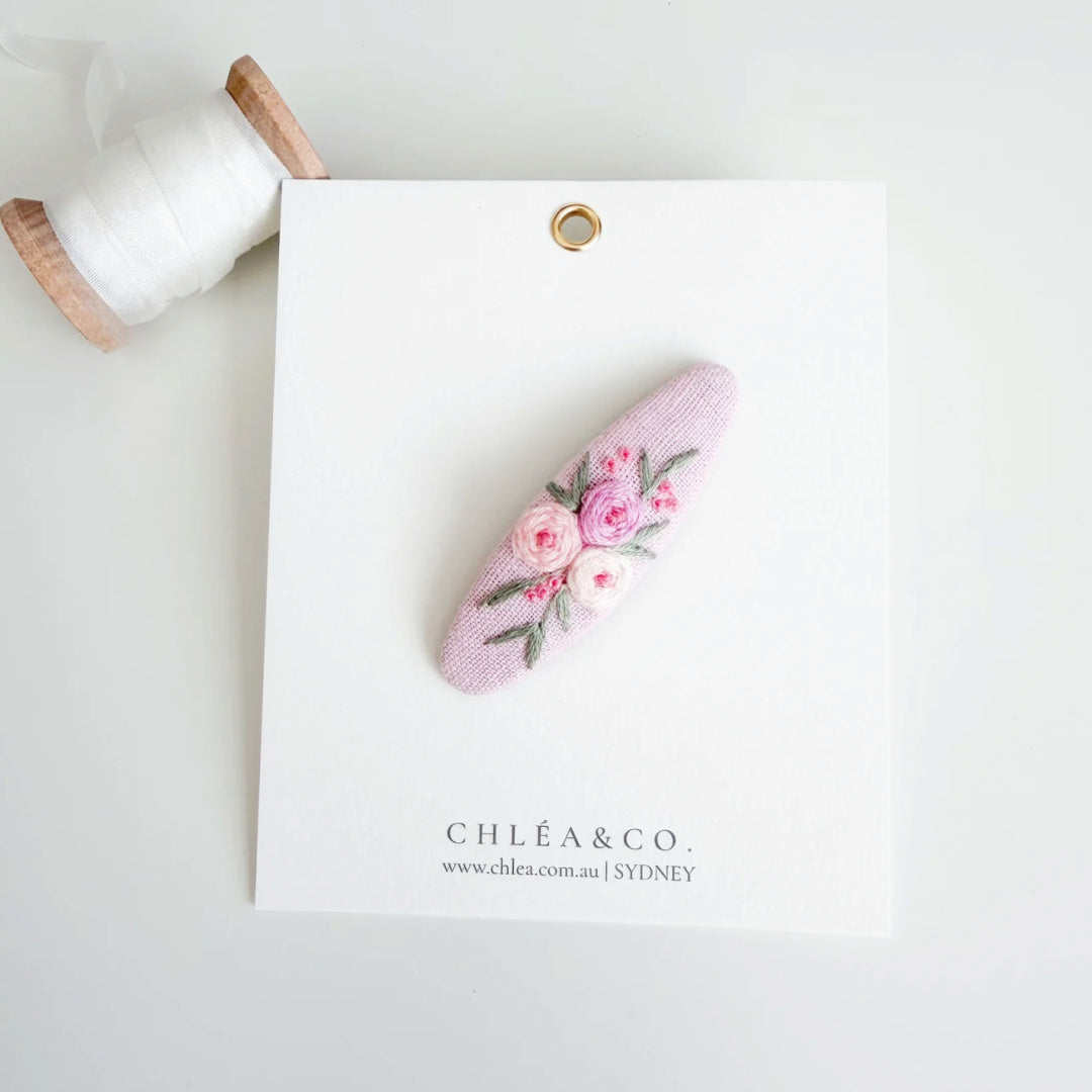 Chléa &amp; Co Embroidered Oval Hair Clip | Rose Bouquet On Pink Linen