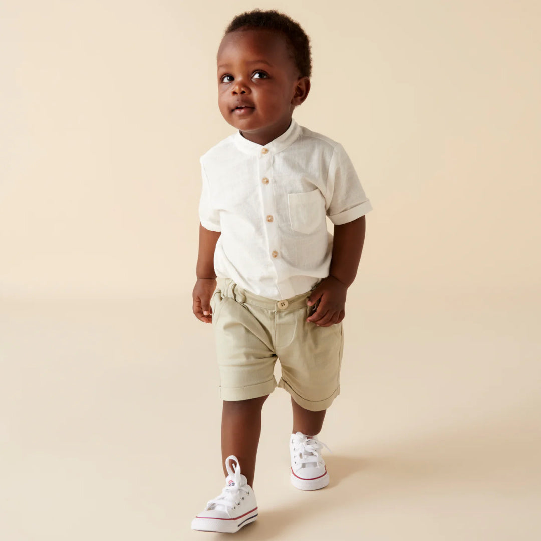 DESIGNER KIDZ LEO S/S BUTTON ROMPER - IVORY