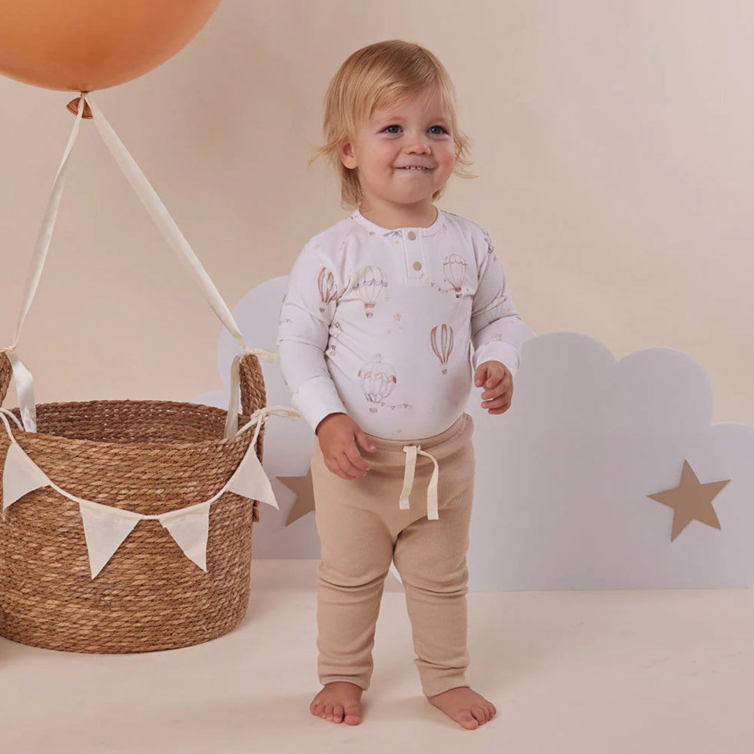 SNUGGLE HUNNY ORGANIC LONG SLEEVE BODYSUIT - UP &amp; AWAY