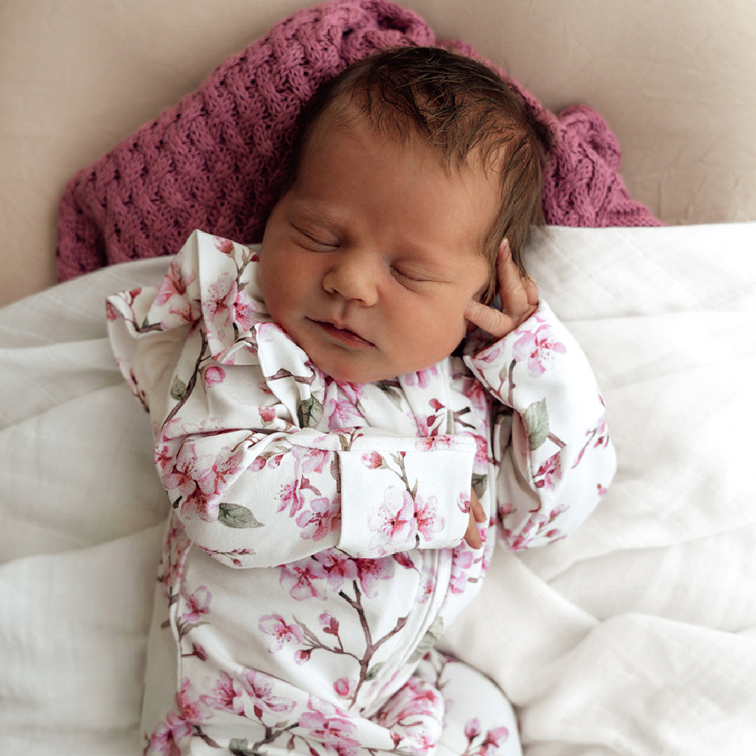 SNUGGLE HUNNY ORGANIC SNUGGLE SLEEPSUIT ZIP FOOTIE WITH FRILL - CHERRY BLOSSOM