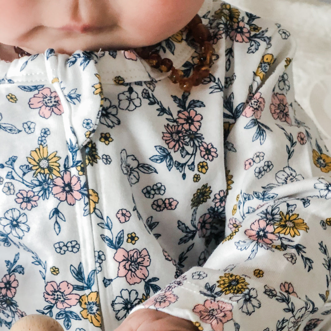 BEBE WHITE LABEL MAE FLORAL ORGANIC LS ROMPER